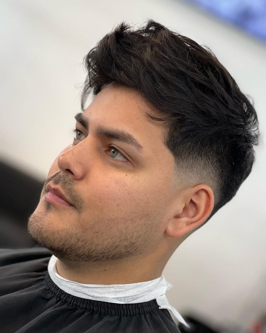 Textured quiff with a clean taper fade